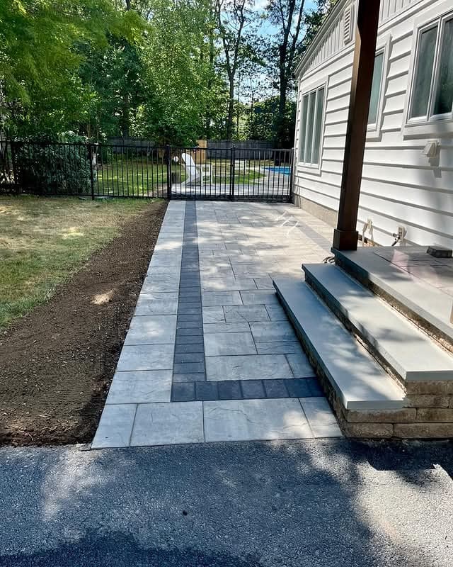 Cambridge paver walkway with bluestone tread steps, completed by Fernando Masonry